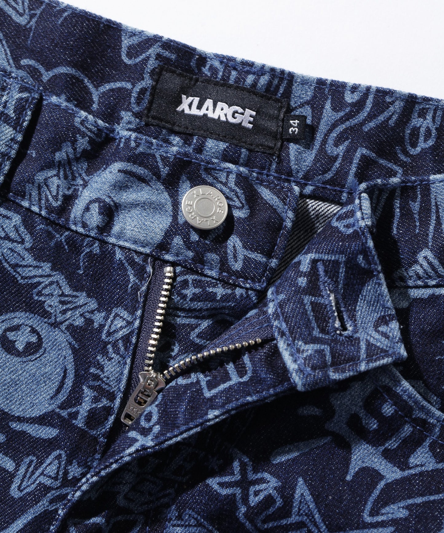 DISCHARGE PRINT DENIM PANTS